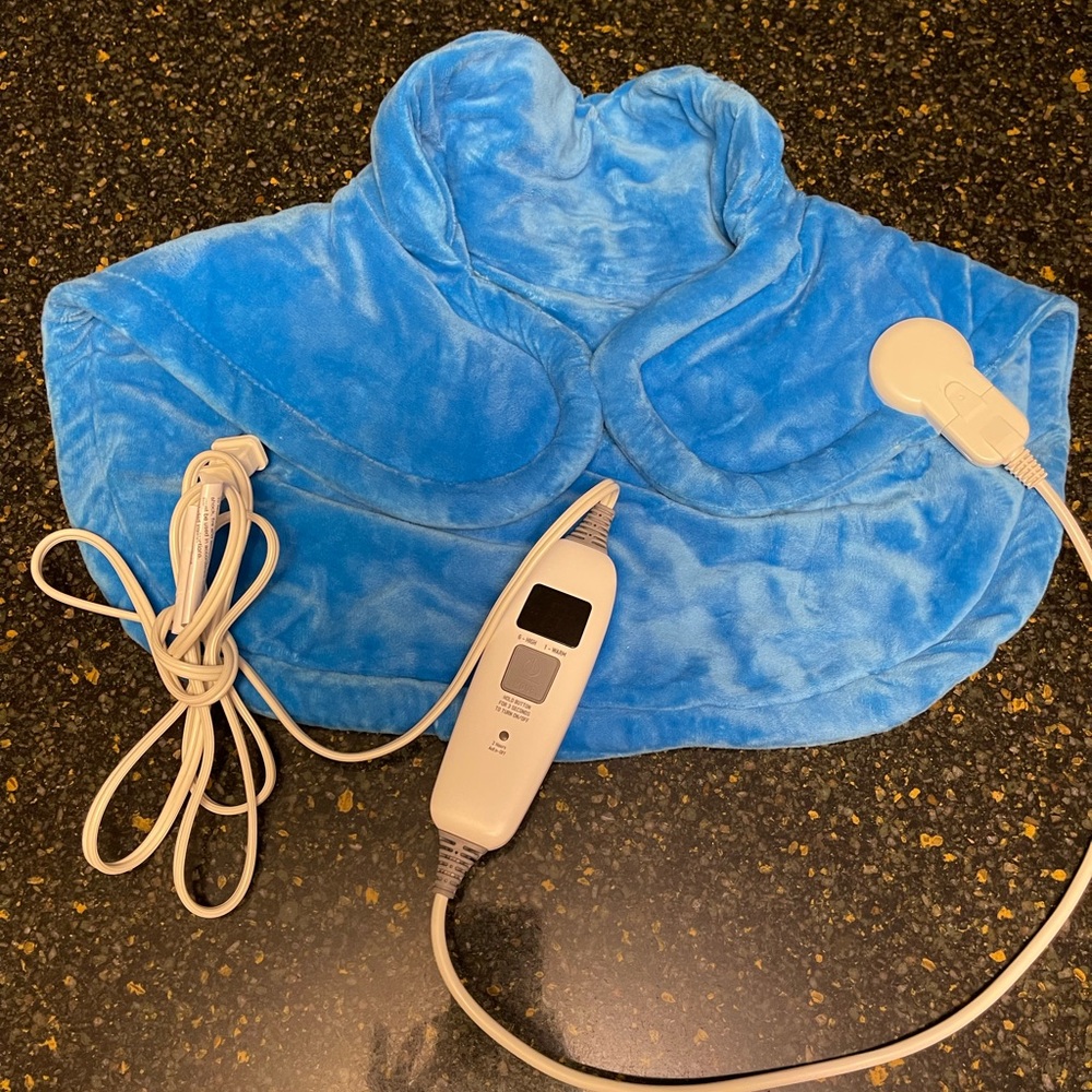 Neck and shoulder heating pad. Pretty blue. No brand name on it.